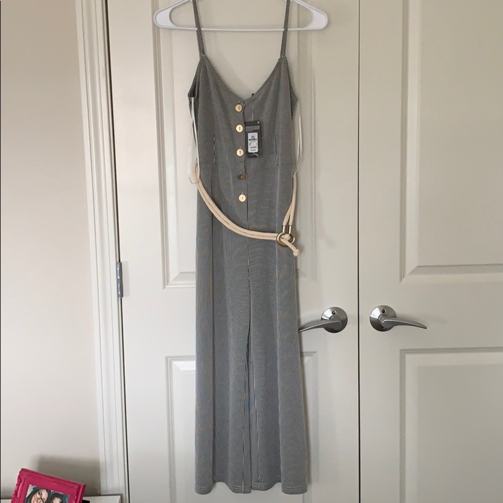 Black & white striped jumpsuit with belt & buttons